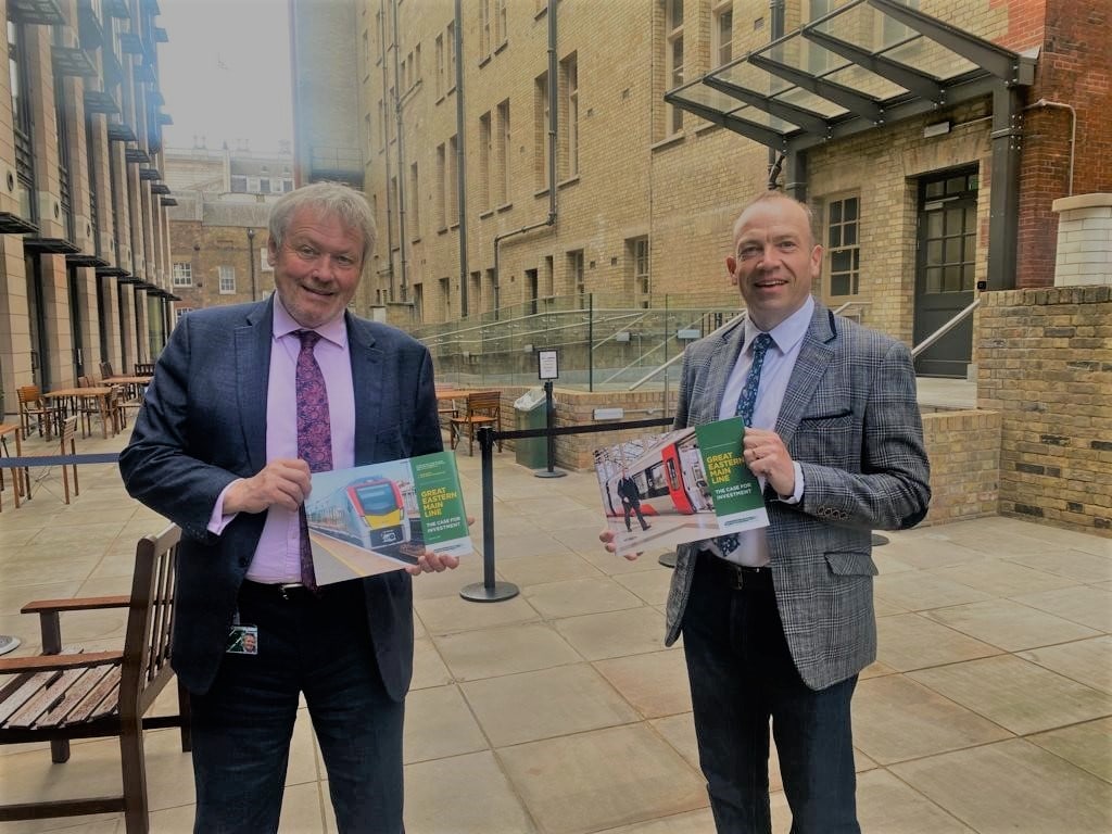 Giles Watling MP, Chair of the Great Eastern Main Line Taskforce, delivering a copy of the new Case for Investment to Chris Heaton-Harris MP, Minister of State for Transport