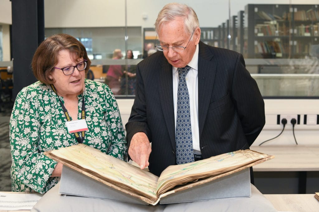 Bridget Hanley, Senior Archivist, Suffolk Archives shows HRH The Duke of Gloucester treasures from the Suffolk Archives