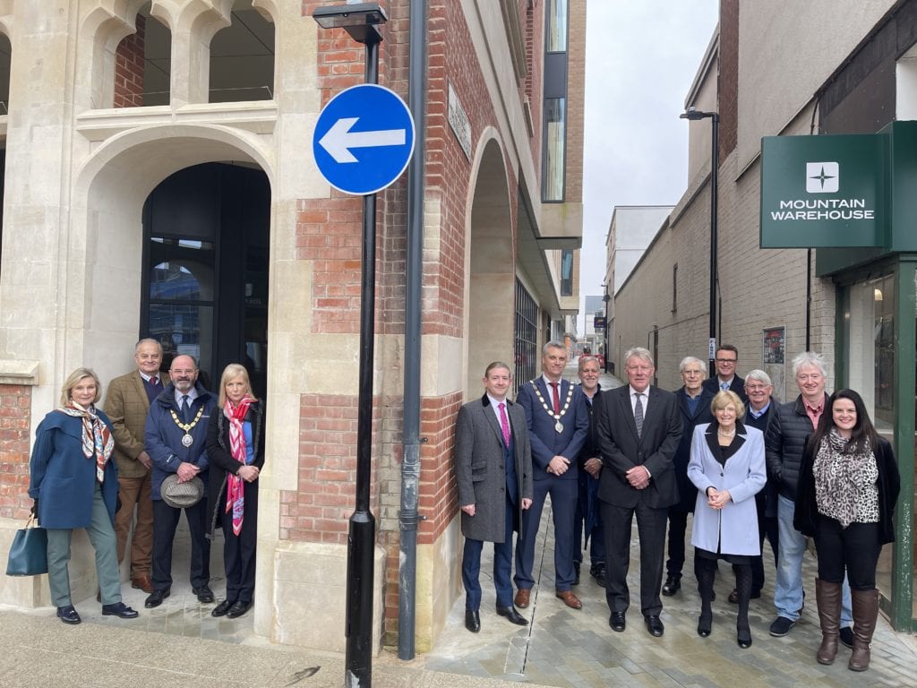 Bury St Edmunds Market Thoroughfare reopens with group of people